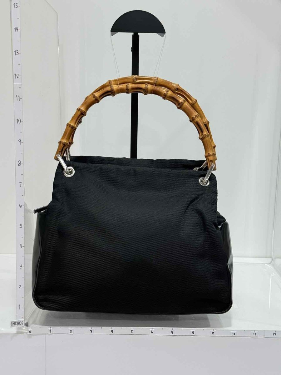 Pre-loved GUCCI Bamboo Black Top Handle at Reems Closet