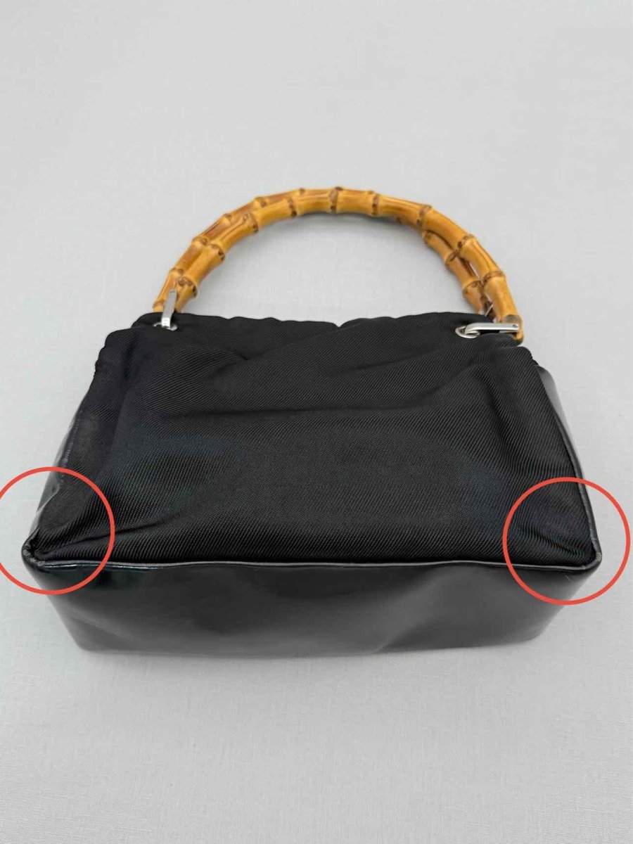 Pre-loved GUCCI Bamboo Black Top Handle at Reems Closet