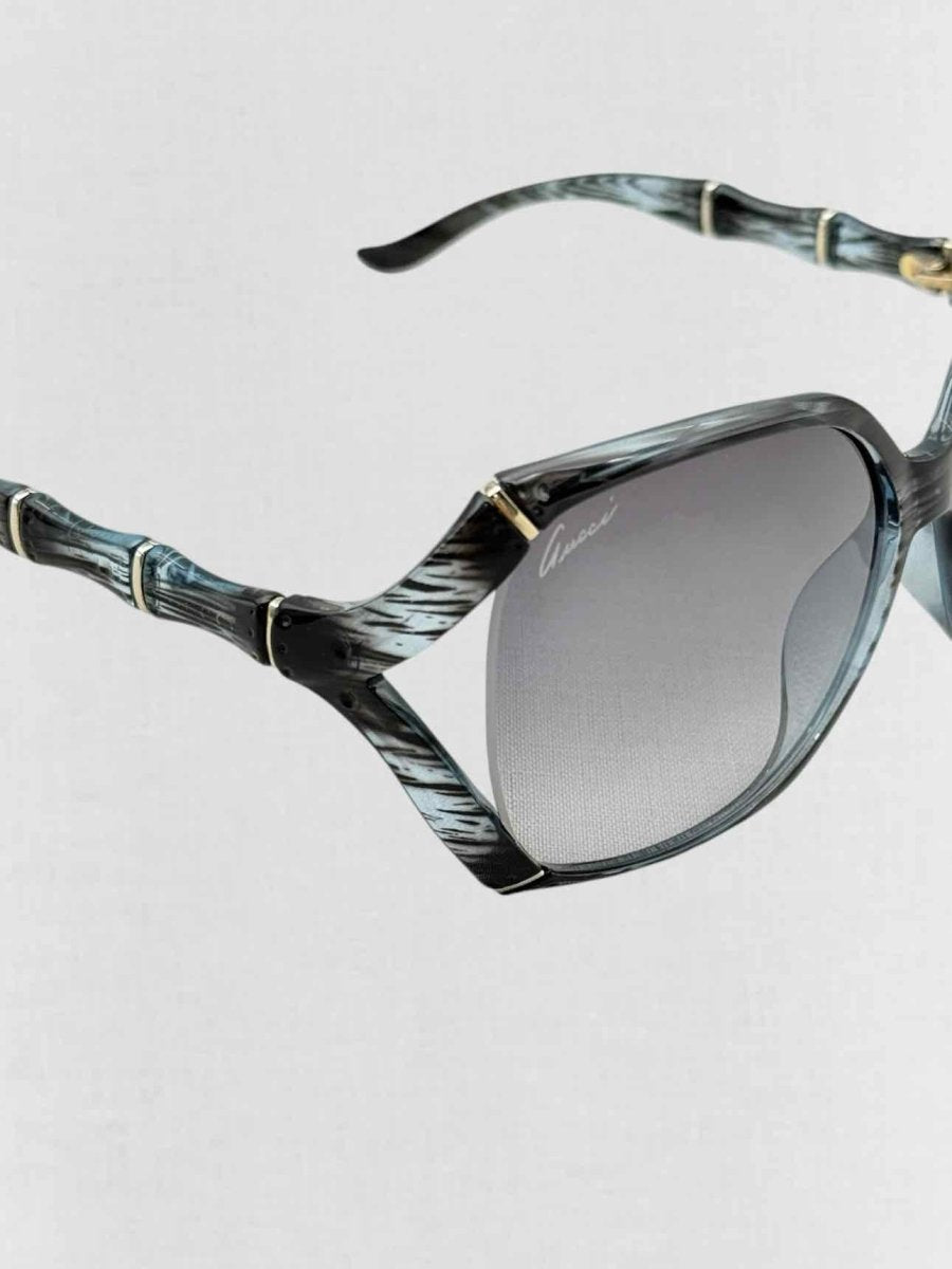 Pre - loved GUCCI Black & Blue Sunglasses at Reems Closet