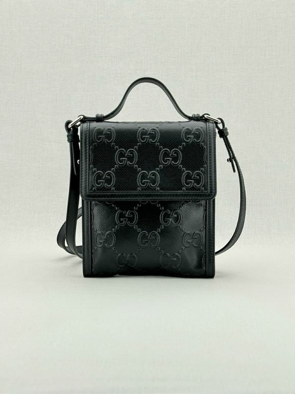 Pre - loved GUCCI Black GG Embossed Crossbody at Reems Closet