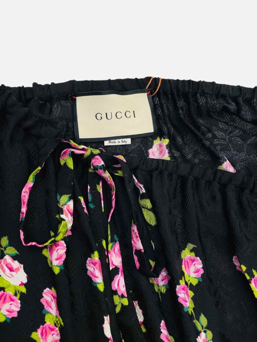 Pre - loved GUCCI Black w/ Pink Rose Print Pants at Reems Closet