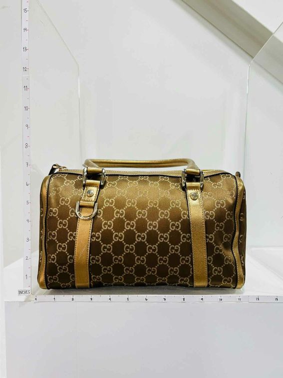 Pre-loved GUCCI Boston Brown & Bronze GG Monogram Top Handle at Reems Closet