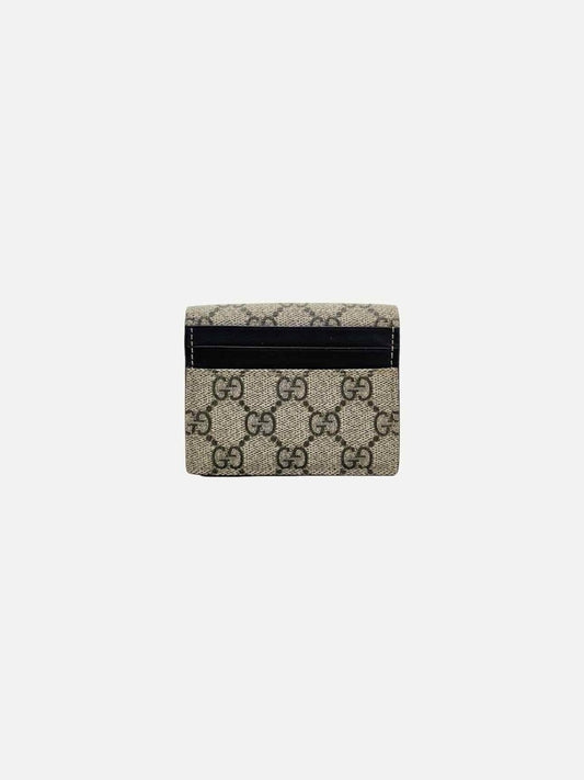 Pre-loved GUCCI Brown & Beige GG Supreme Compact Wallet from Reems Closet