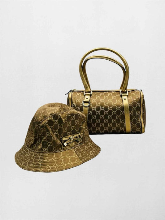 Pre-loved GUCCI Brown & Bronze GG Monogram Top Handle at Reems Closet