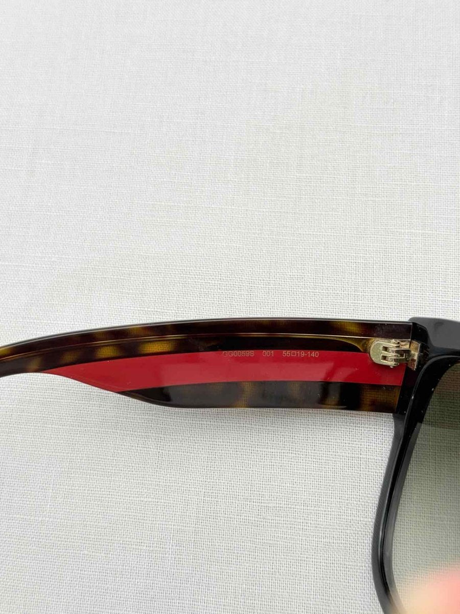 Pre-loved GUCCI Brown Logo Stud Sunglasses at Reems Closet