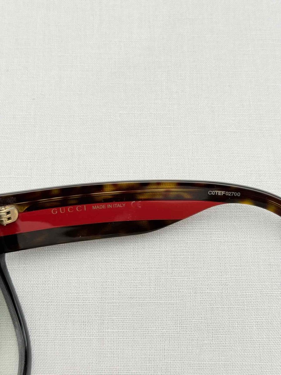 Pre-loved GUCCI Brown Logo Stud Sunglasses at Reems Closet