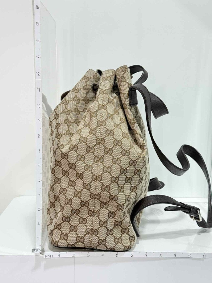 Pre - loved GUCCI Drawstring Brown GG Backpack at Reems Closet