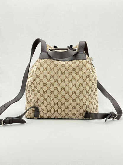 Pre - loved GUCCI Drawstring Brown GG Backpack at Reems Closet