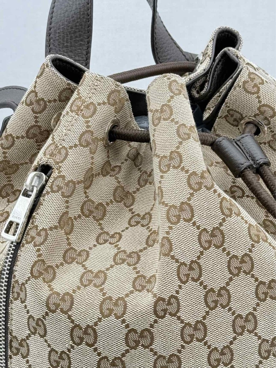 Pre - loved GUCCI Drawstring Brown GG Backpack at Reems Closet