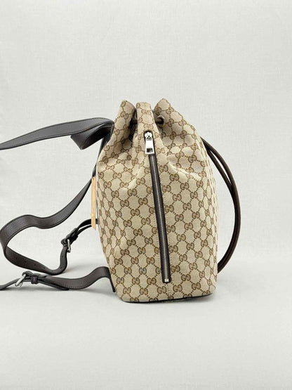 Pre - loved GUCCI Drawstring Brown GG Backpack at Reems Closet
