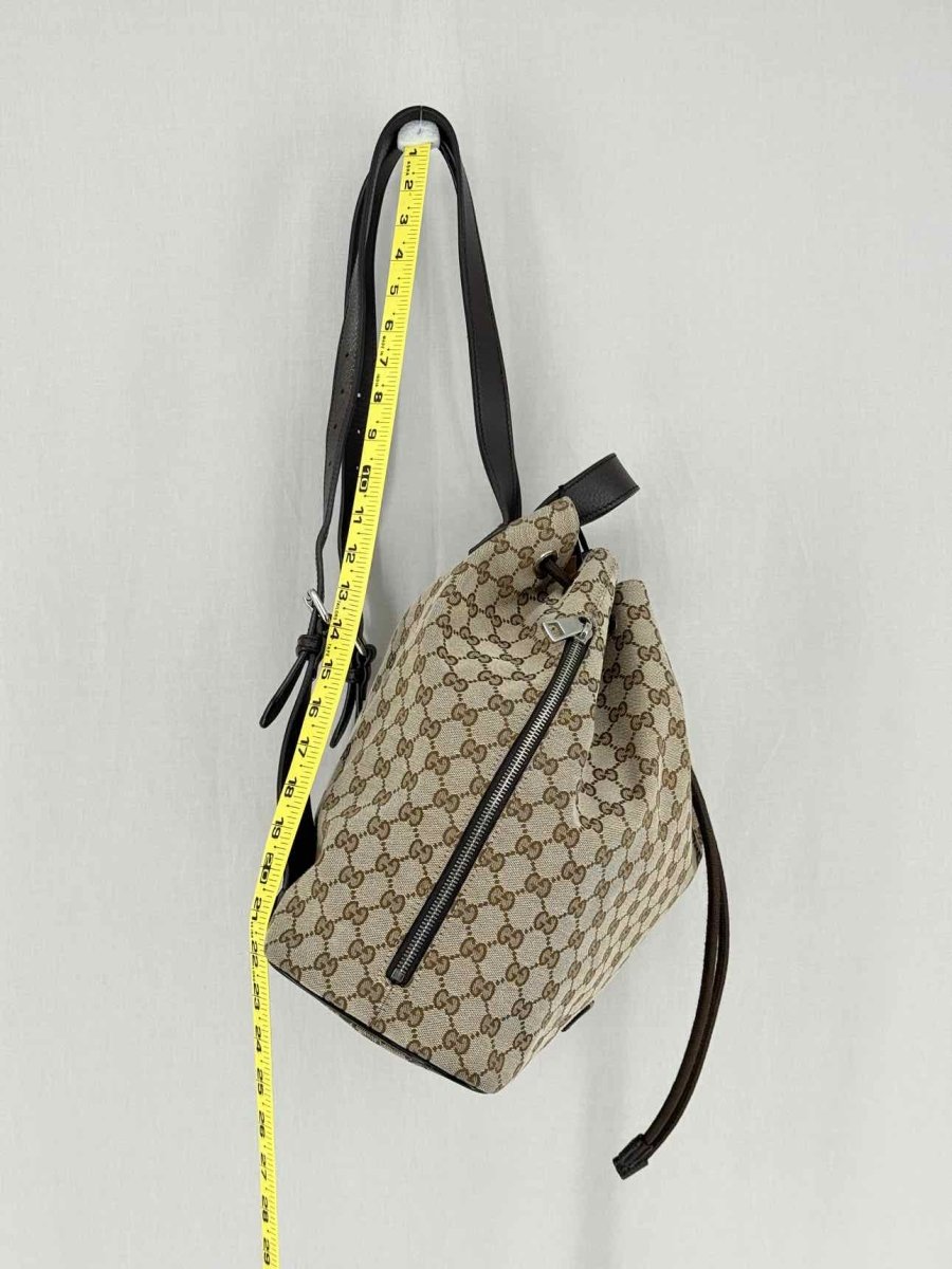 Pre - loved GUCCI Drawstring Brown GG Backpack at Reems Closet