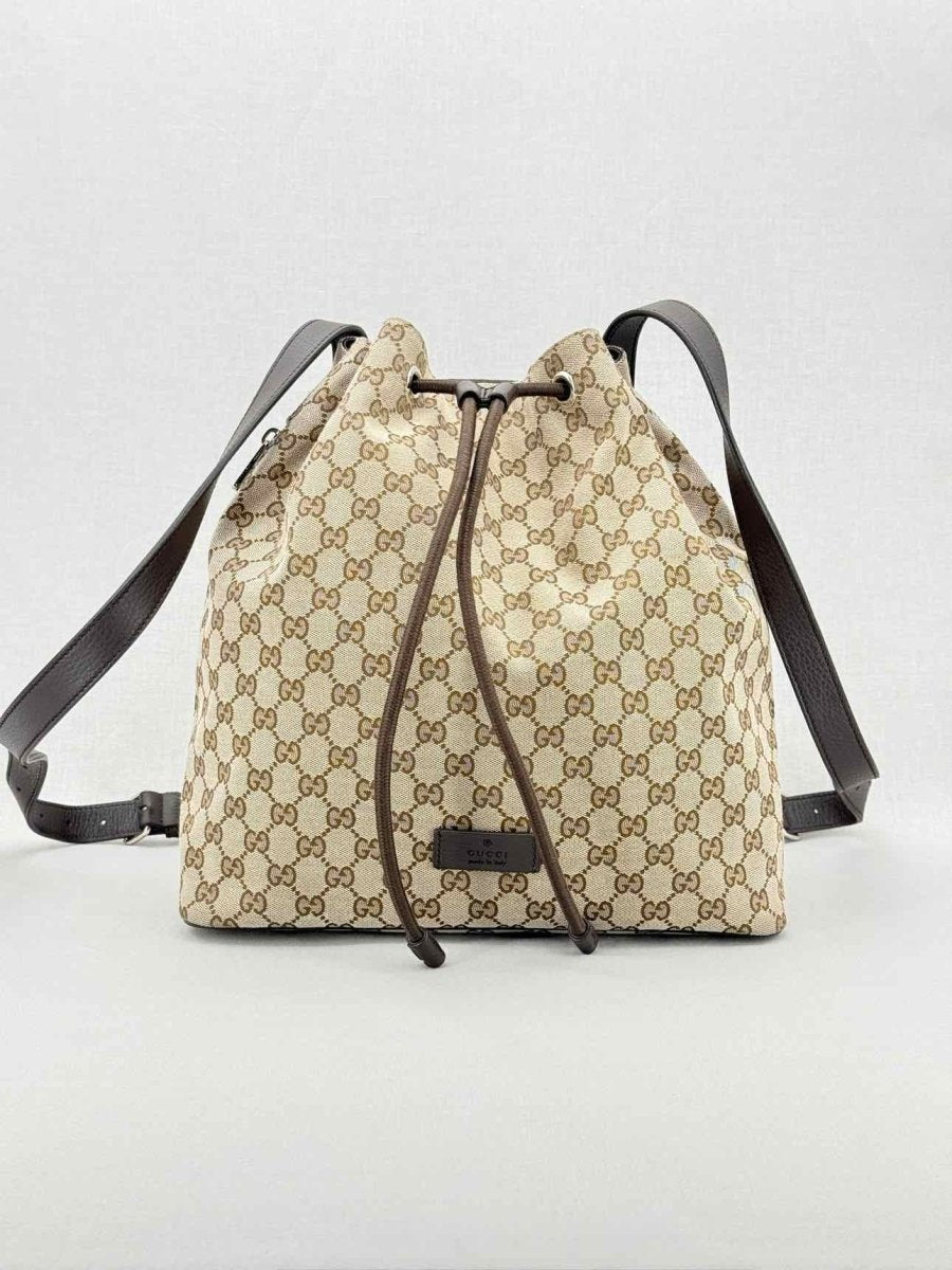 Pre - loved GUCCI Drawstring Brown GG Backpack at Reems Closet