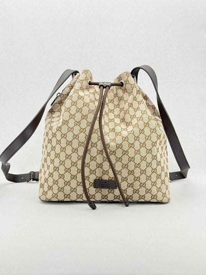 Pre - loved GUCCI Drawstring Brown GG Backpack at Reems Closet