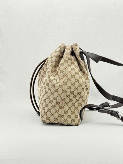 Pre - loved GUCCI Drawstring Brown GG Backpack at Reems Closet