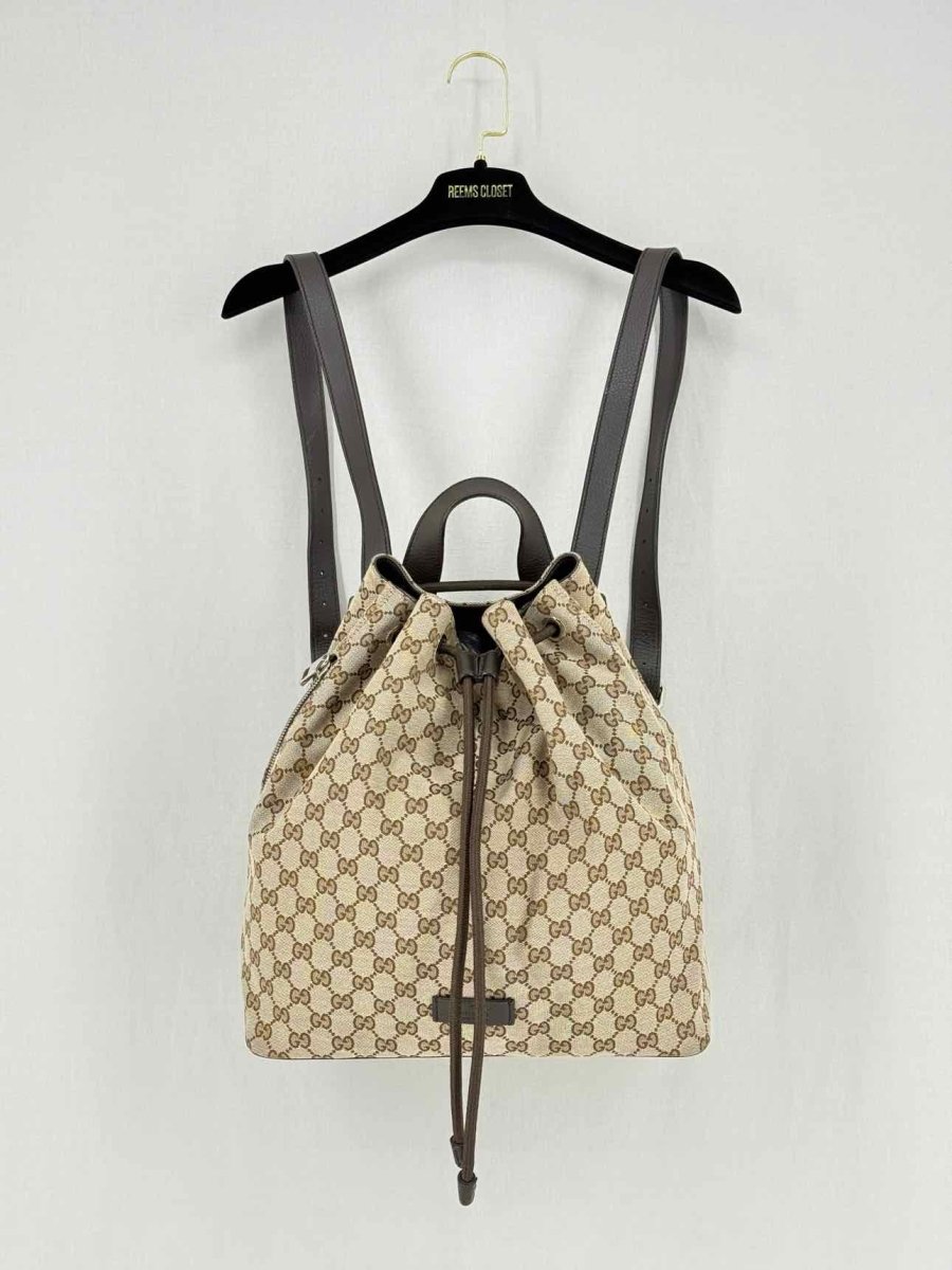 Pre - loved GUCCI Drawstring Brown GG Backpack at Reems Closet