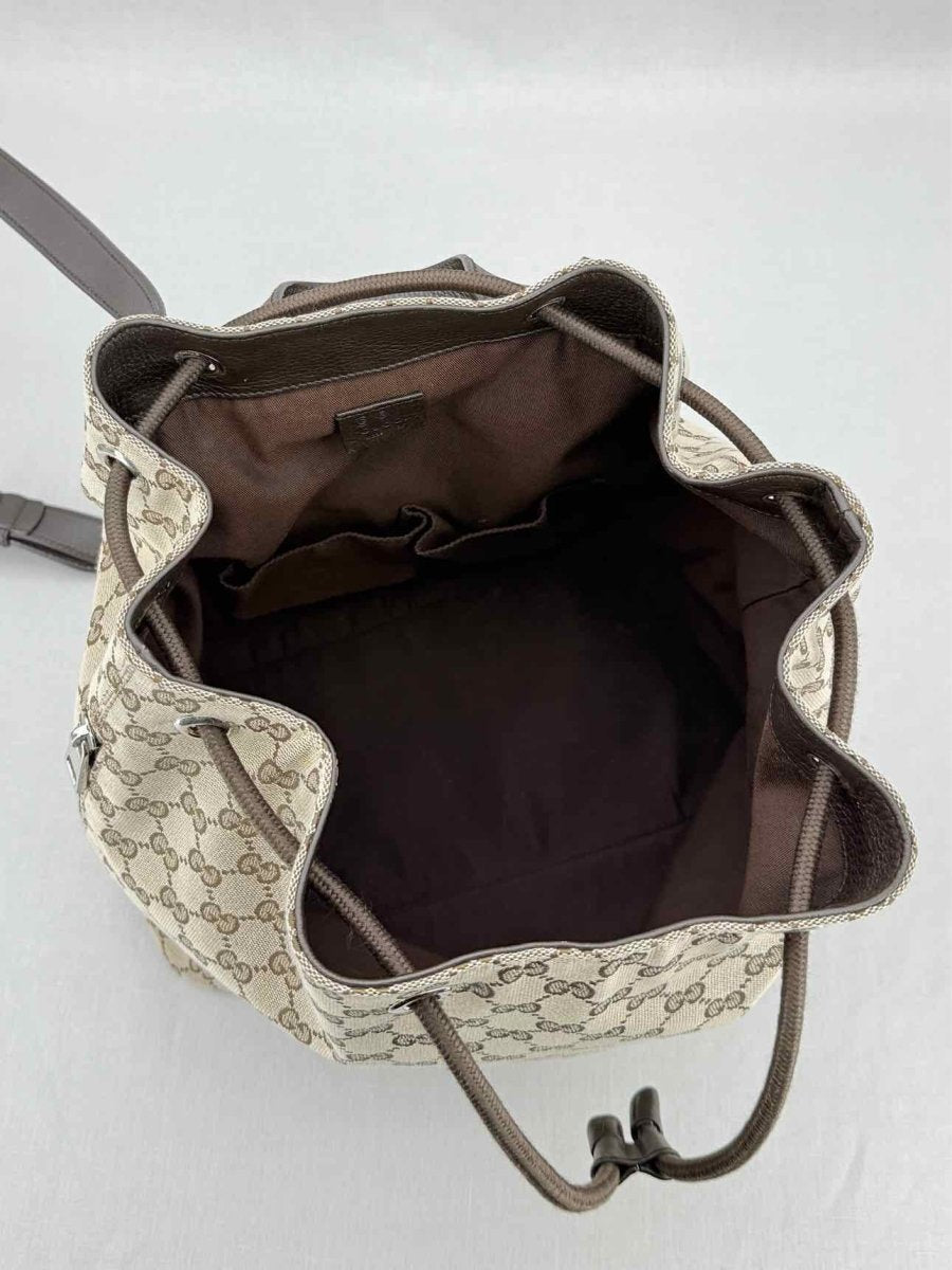 Pre - loved GUCCI Drawstring Brown GG Backpack at Reems Closet