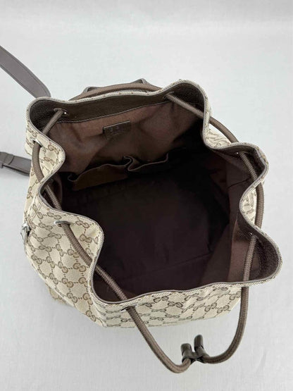 Pre - loved GUCCI Drawstring Brown GG Backpack at Reems Closet
