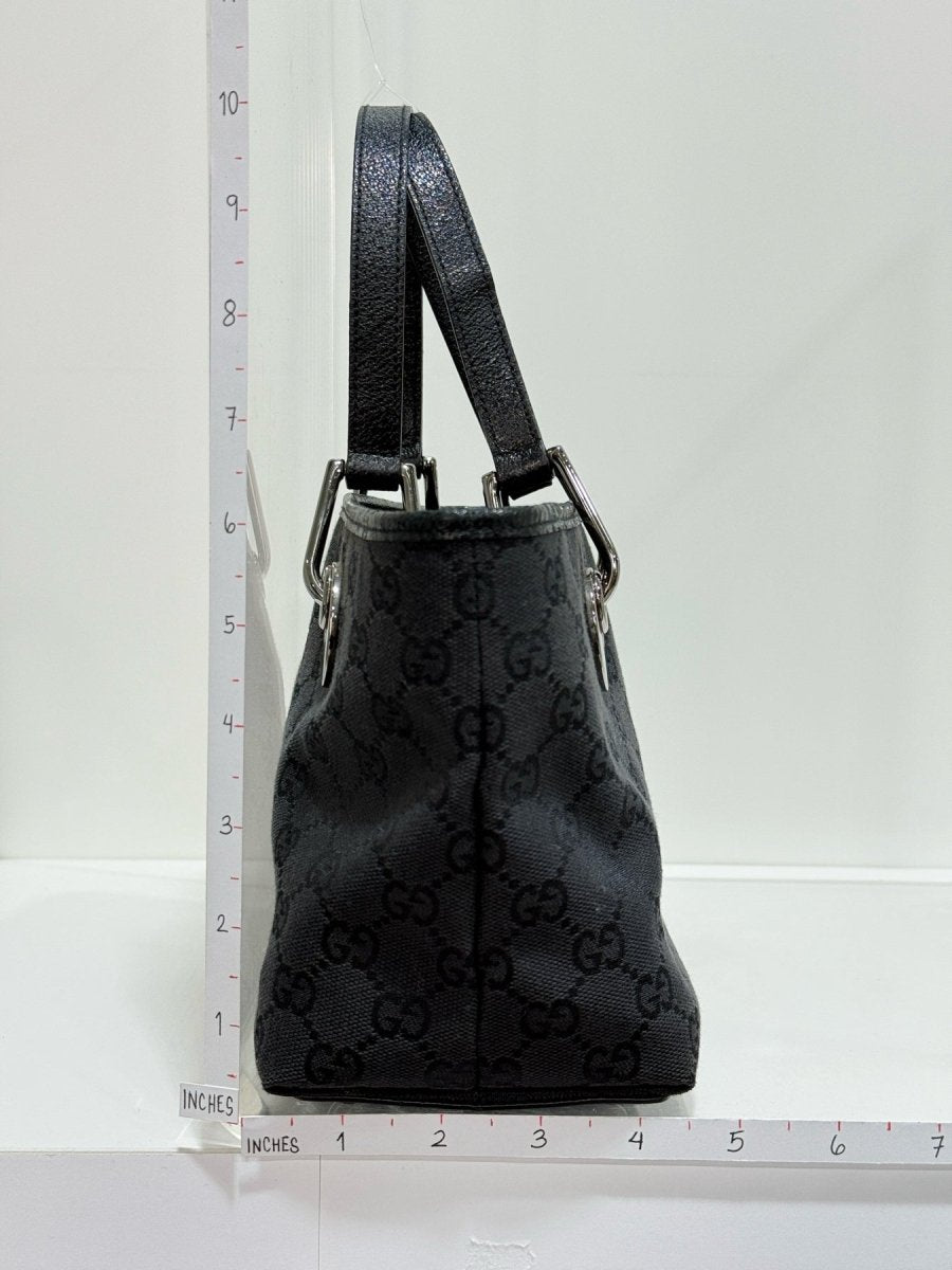 Pre - loved GUCCI Eclipse Black GG Tote Bag at Reems Closet