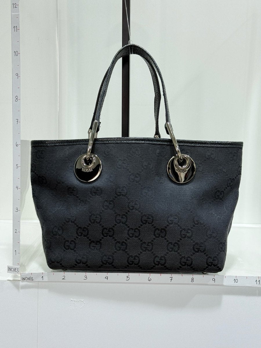 Pre - loved GUCCI Eclipse Black GG Tote Bag at Reems Closet