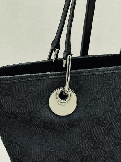 Pre - loved GUCCI Eclipse Black GG Tote Bag at Reems Closet
