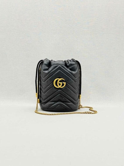 Pre-loved GUCCI GG Marmont Black Chevron Bucket Bag at Reems Closet