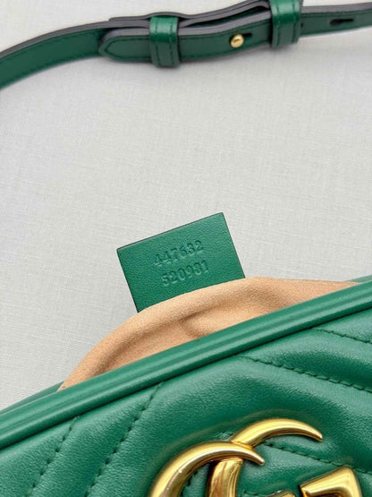 Pre-loved GUCCI GG Marmont Camera Green Chevron Crossbody at Reems Closet
