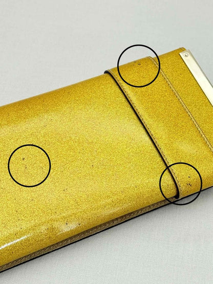 Pre - loved GUCCI GG Romy Gold Clutch at Reems Closet