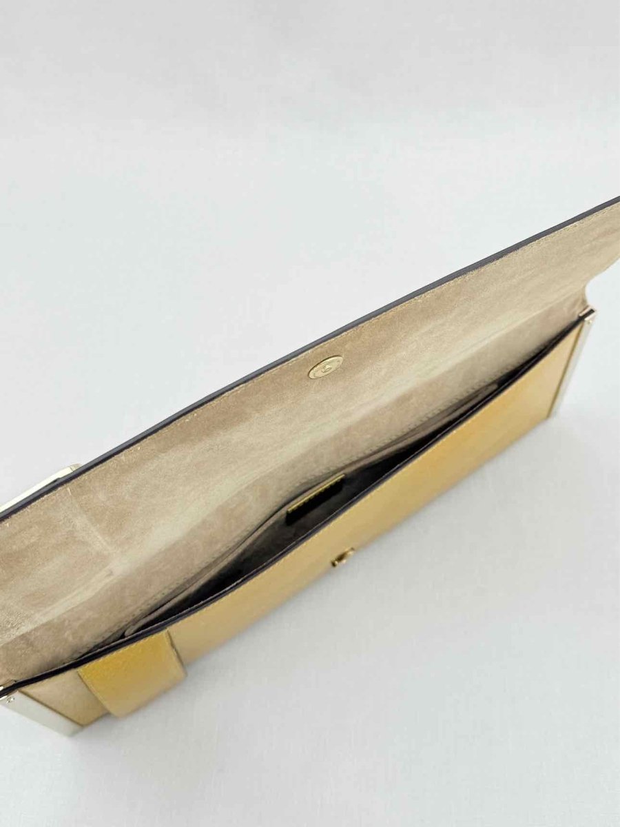 Pre - loved GUCCI GG Romy Gold Clutch at Reems Closet