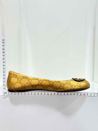 Pre - loved GUCCI Gold GG Logo Size EU 37.5 Ballet Flats at Reems Closet