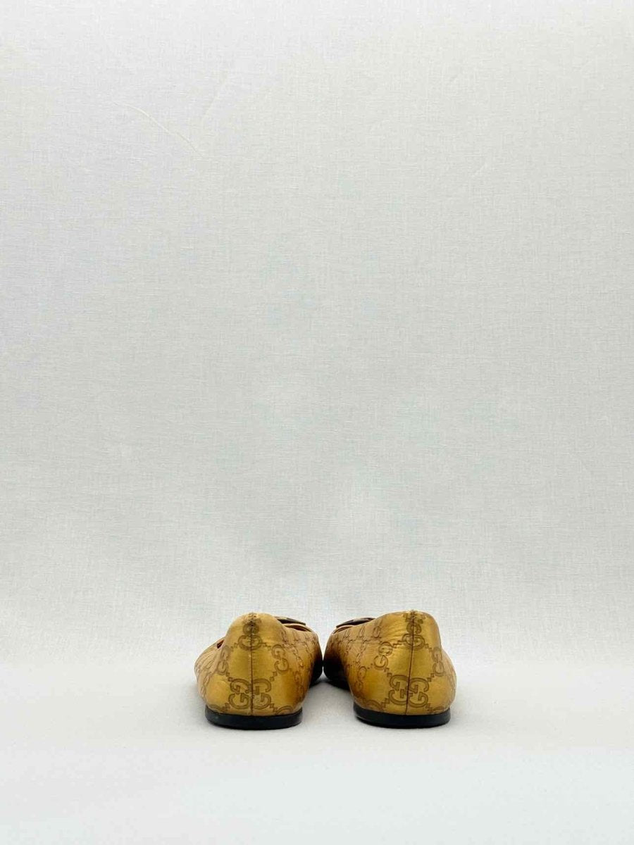 Pre - loved GUCCI Gold GG Logo Size EU 37.5 Ballet Flats at Reems Closet