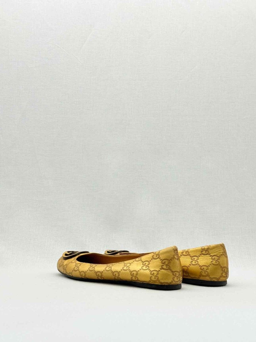 Pre - loved GUCCI Gold GG Logo Size EU 37.5 Ballet Flats at Reems Closet