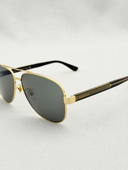 Pre - loved GUCCI Green Sunglasses at Reems Closet