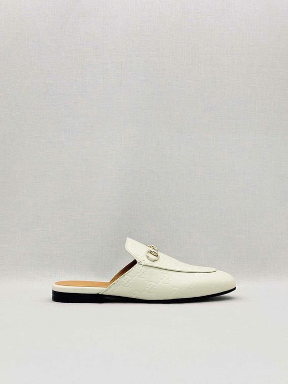 Pre-loved GUCCI Horsebit White GG Embossed Size EU 37.5 Mules at Reems Closet