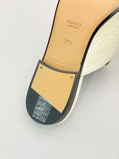 Pre-loved GUCCI Horsebit White GG Embossed Size EU 37.5 Mules at Reems Closet