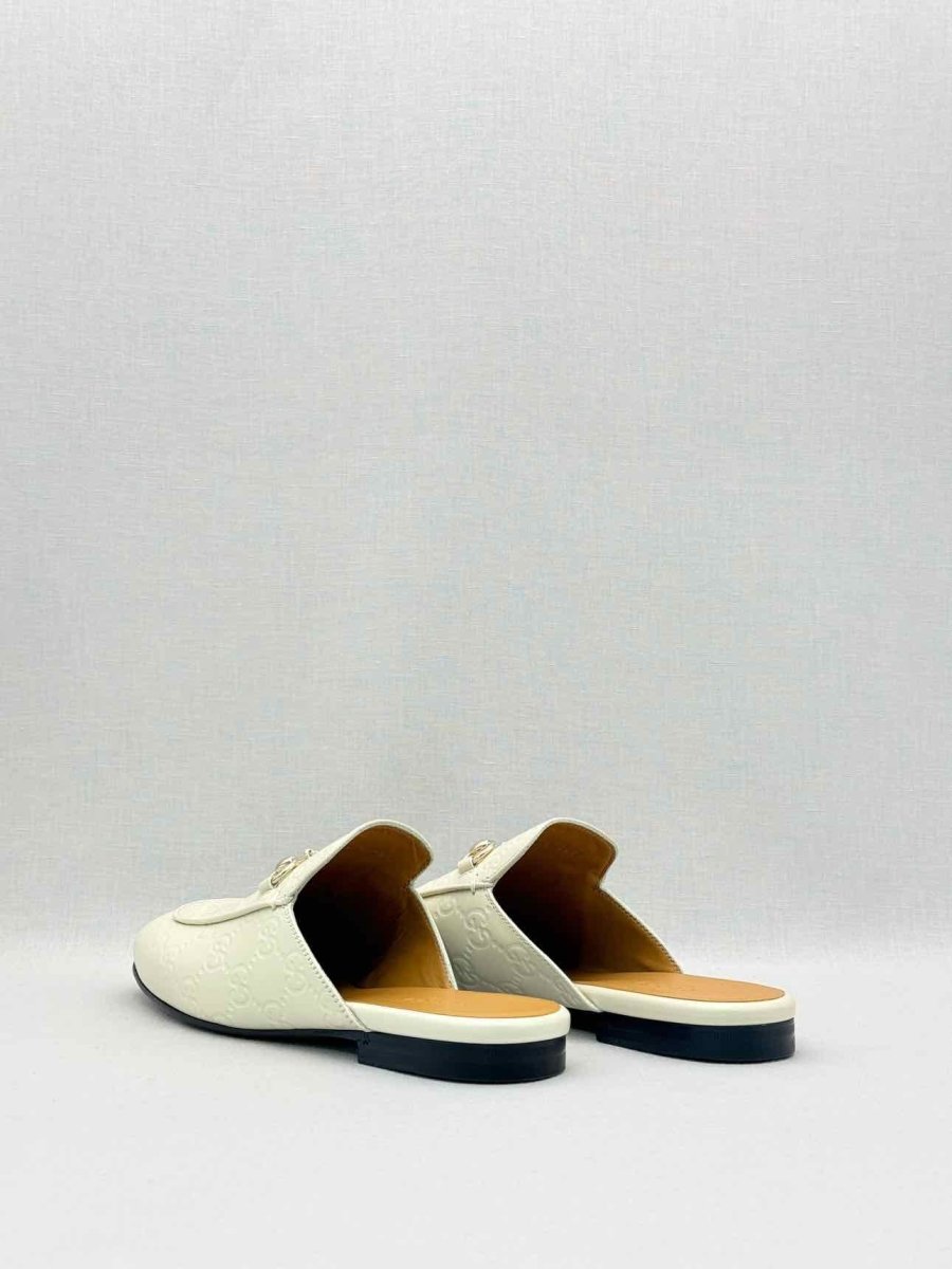 Pre-loved GUCCI Horsebit White GG Embossed Size EU 37.5 Mules at Reems Closet