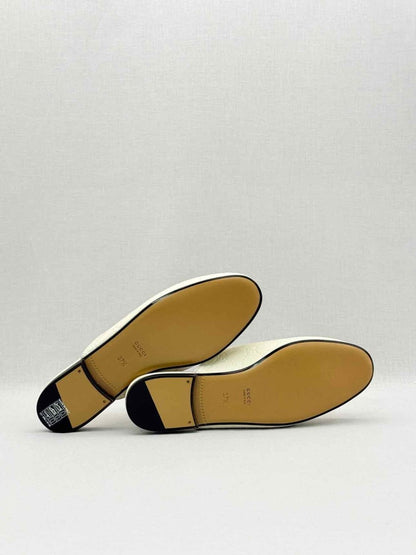 Pre-loved GUCCI Horsebit White GG Embossed Size EU 37.5 Mules at Reems Closet