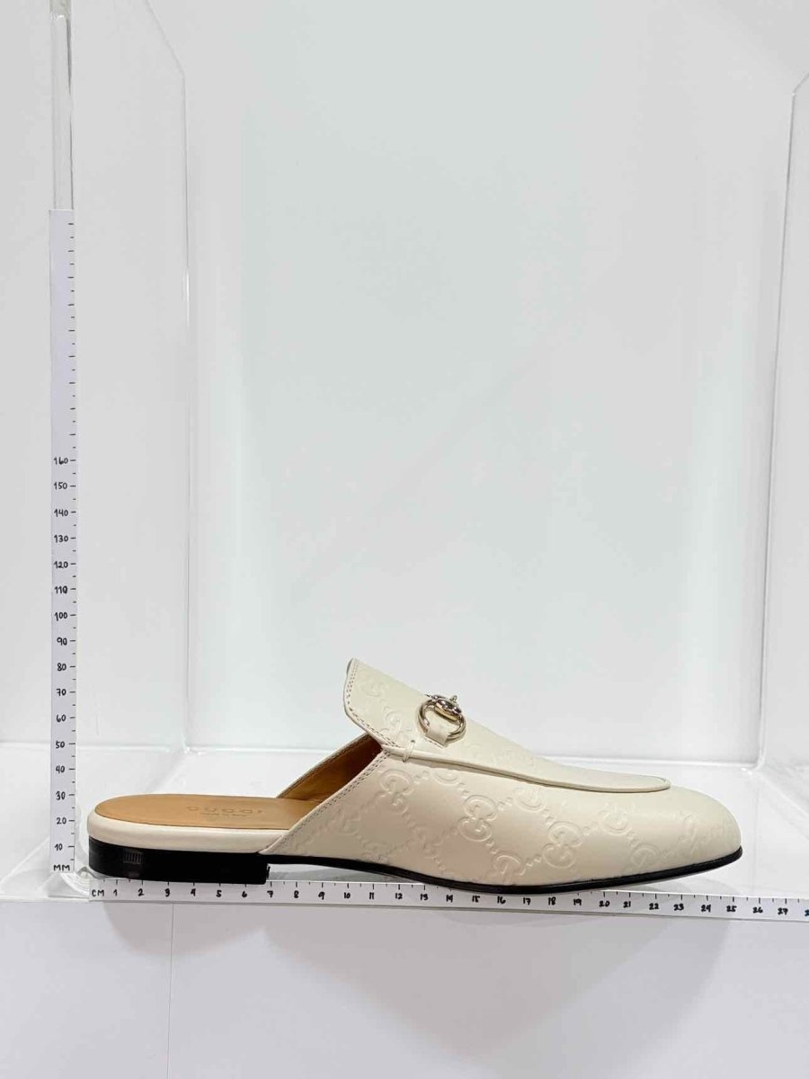 Pre-loved GUCCI Horsebit White GG Embossed Size EU 37.5 Mules at Reems Closet