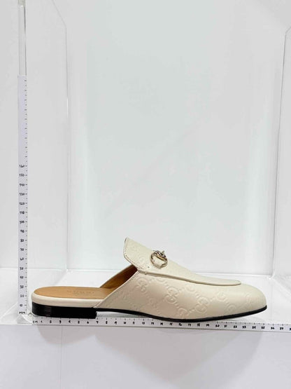 Pre-loved GUCCI Horsebit White GG Embossed Size EU 37.5 Mules at Reems Closet