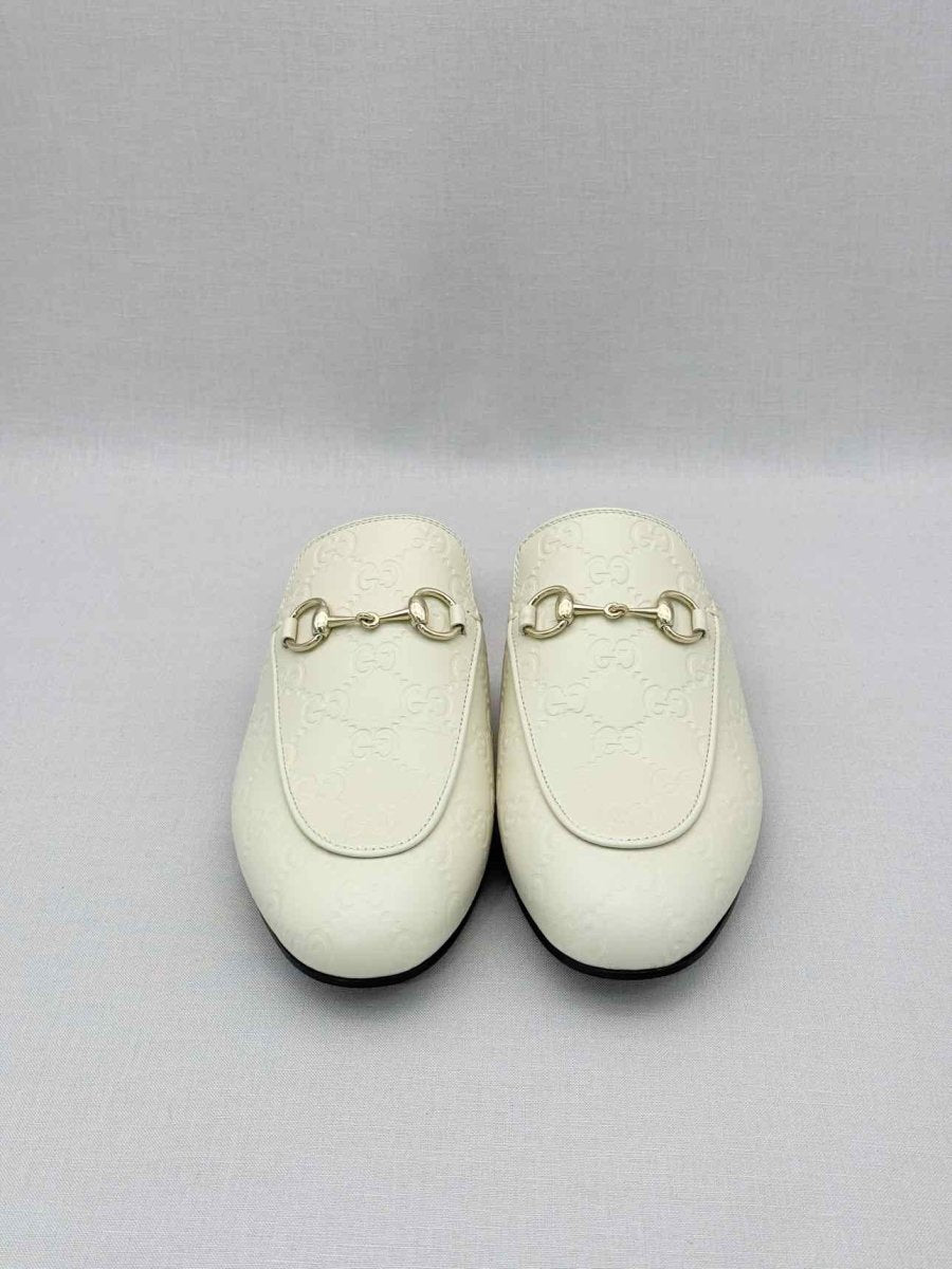 Pre-loved GUCCI Horsebit White GG Embossed Size EU 37.5 Mules at Reems Closet