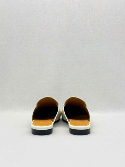 Pre-loved GUCCI Horsebit White GG Embossed Size EU 37.5 Mules at Reems Closet