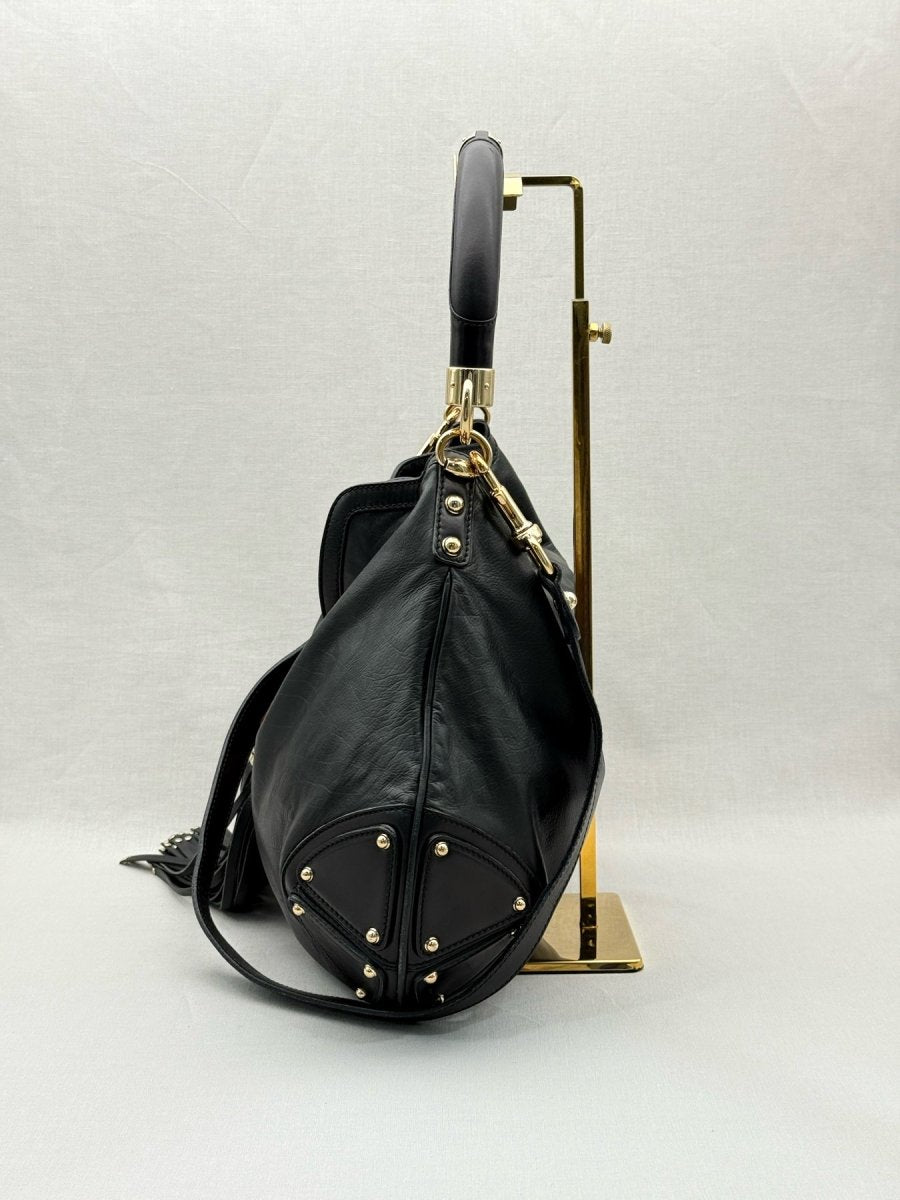Pre - loved GUCCI Indy Black Hobo bag at Reems Closet