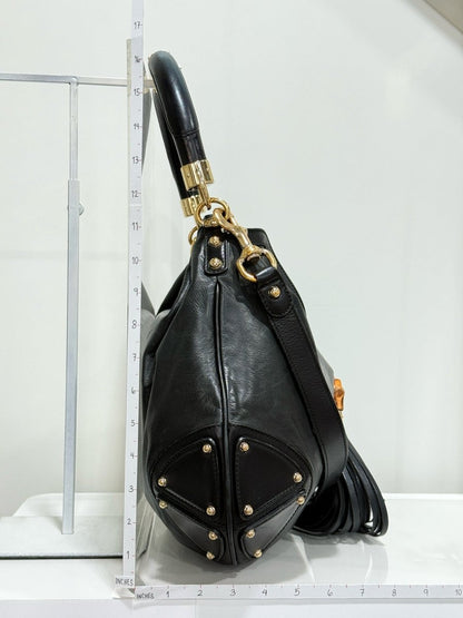 Pre - loved GUCCI Indy Black Hobo bag at Reems Closet