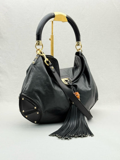 Pre - loved GUCCI Indy Black Hobo bag at Reems Closet