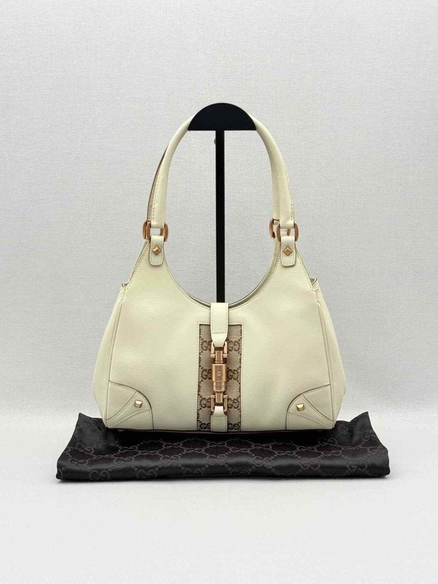 Pre-loved GUCCI Jackie Nailhead Beige GG Hobo bag at Reems Closet