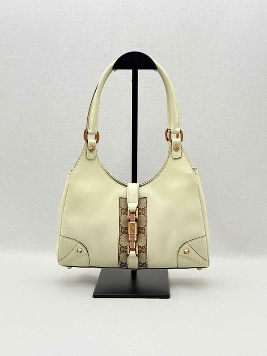 Pre-loved GUCCI Jackie Nailhead Beige GG Hobo bag at Reems Closet