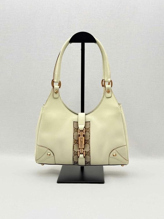 Pre-loved GUCCI Jackie Nailhead Beige GG Hobo bag at Reems Closet