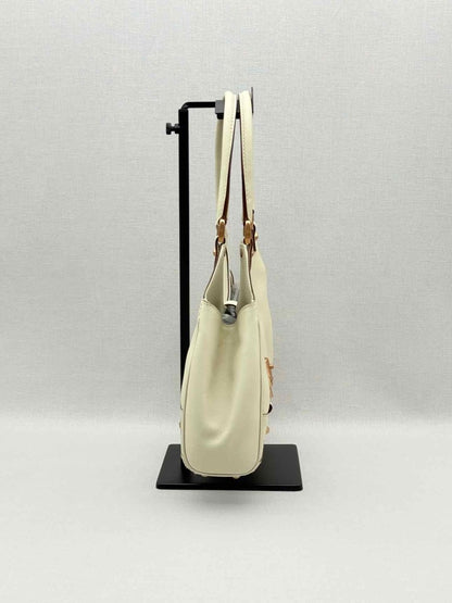 Pre-loved GUCCI Jackie Nailhead Beige GG Hobo bag at Reems Closet