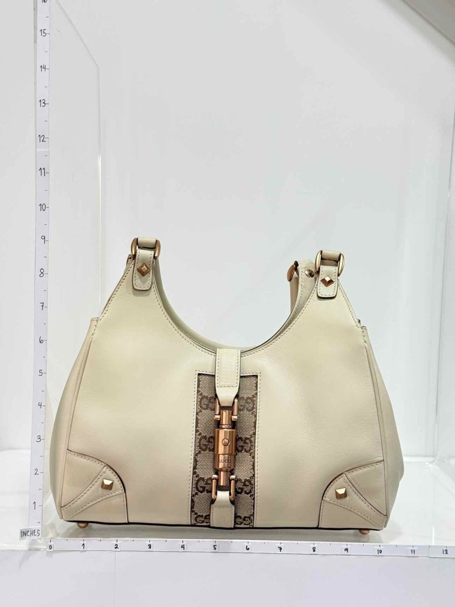 Pre-loved GUCCI Jackie Nailhead Beige GG Hobo bag at Reems Closet