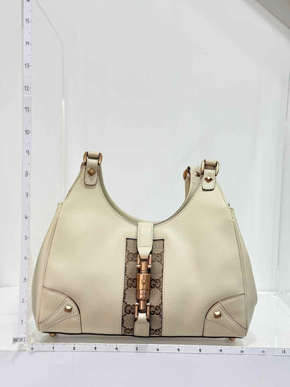 Pre-loved GUCCI Jackie Nailhead Beige GG Hobo bag at Reems Closet