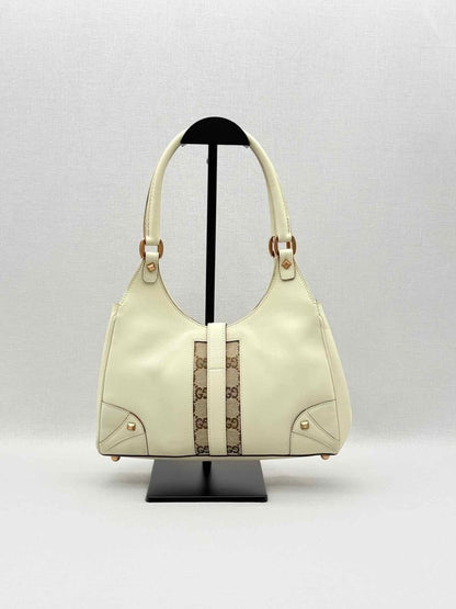 Pre-loved GUCCI Jackie Nailhead Beige GG Hobo bag at Reems Closet
